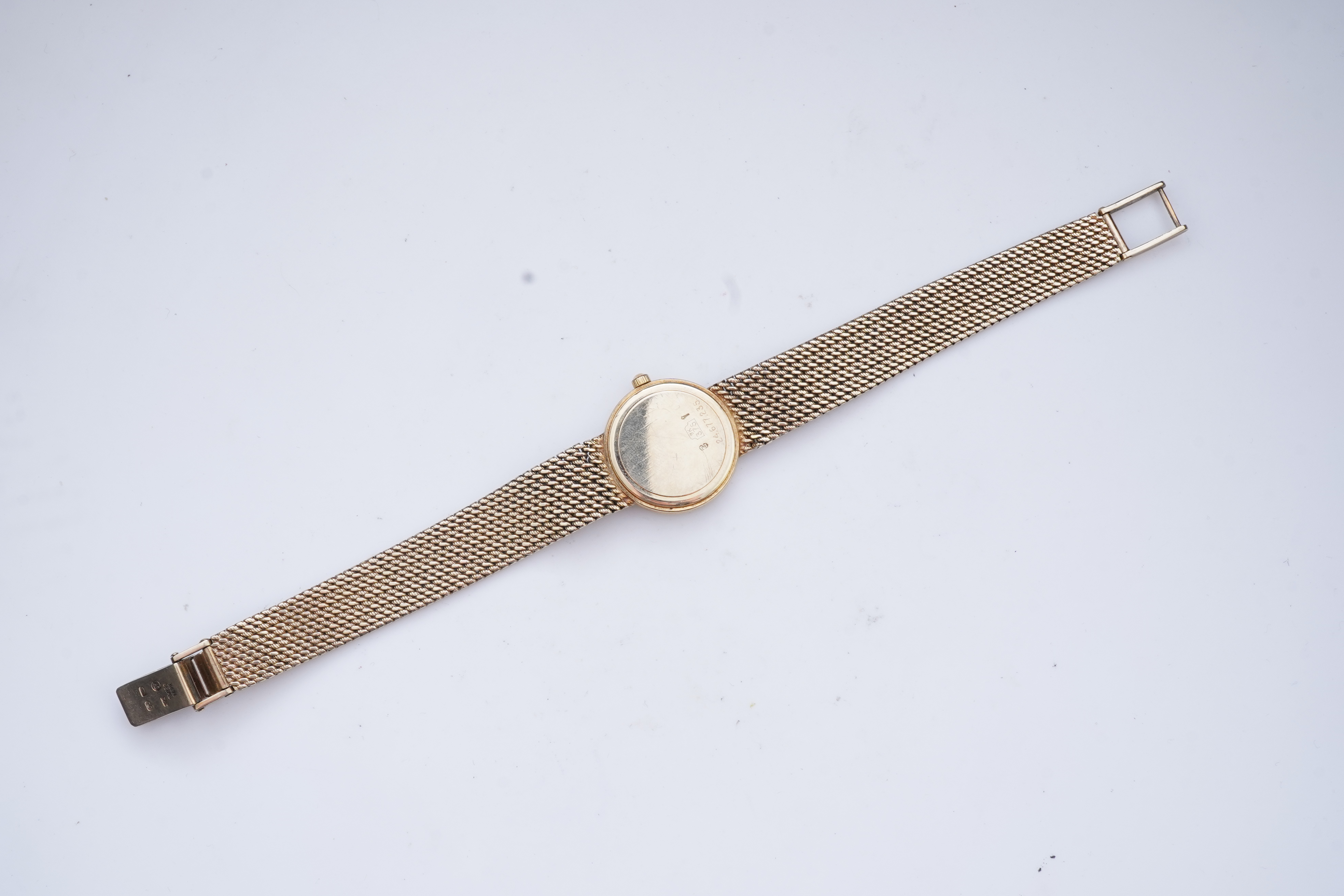 Longines, a gold watch
